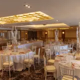 modern wedding reception hall with white linen