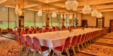 corporate conference room arrangement with large meeting table
