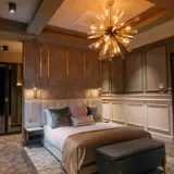 bed inside honeymoon suite at The Torrance Hotel in East Kilbride