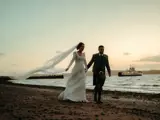 couple on beach at largs wedding venue