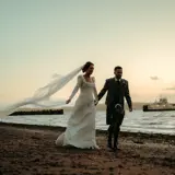 couple on beach at largs wedding venue